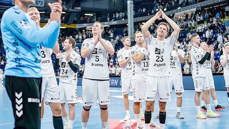 Kiels Handballer wollen auch nach dem Königsklassen-Auftakt bei Meschkow Brest Grund zum Jubel haben. Foto: Axel Heimken/dpa