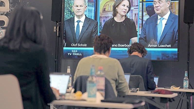 Eine Woche vor der Bundestagswahl stellen sich Scholz, Baerbock und Laschet einem dritten TV-Triell. Foto: Kay Nietfeld/dpa