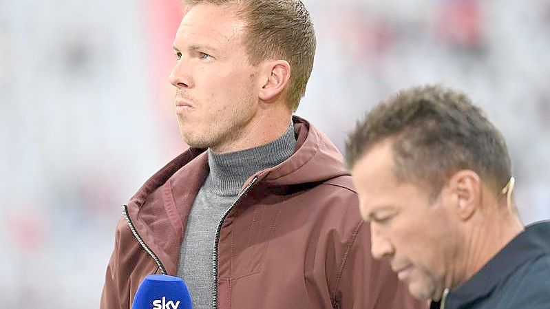 Bei seinem Trainer-Ranking hat Experte Lothar Matthäus dem neuen Bayern-Coach Julian Nagelsmann (l) mit einer Eins bewertet. Foto: Sven Hoppe/dpa