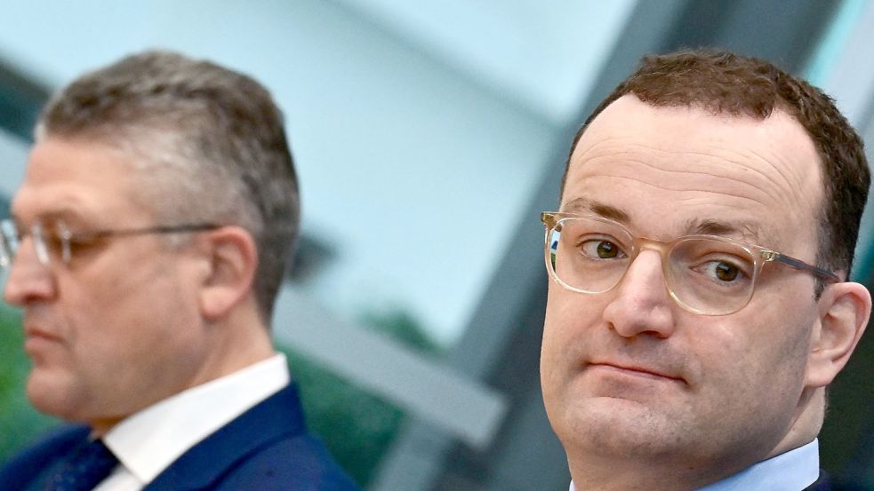 Gesundheitsminister Jens Spahn und Robert Koch-Chef Lothar Wieler äußern sich zur Gefährlichkeit der neuen Corona-Mutation. Foto: AFP/Tobias Schwarz