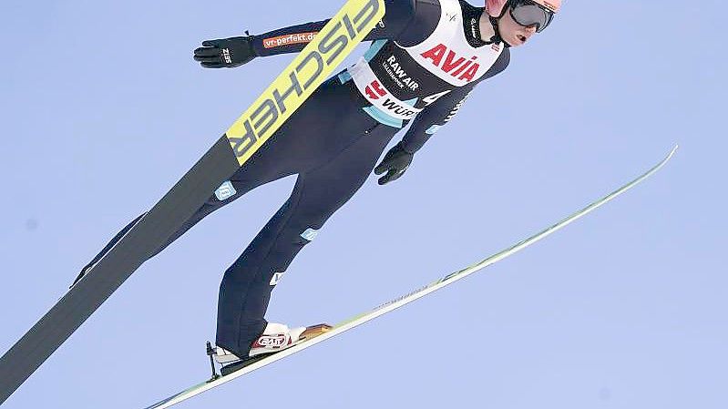 Sprang in Lillehammer auf Rang drei: Karl Geiger in Aktion. Foto: Terje Bendiksby/NTB/dpa
