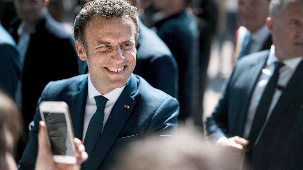 Strahlendes Lächeln eines Siegers: Frankreichs alter und neuer Staatspräsident Emmanuel Macron. Foto: picture alliance/dpa/AP