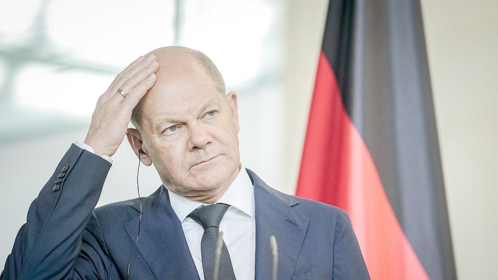 Bundeskanzler Olaf Scholz wurde bei dem Zwischenfall nicht verletzt. Foto: Kay Nietfeld/dpa