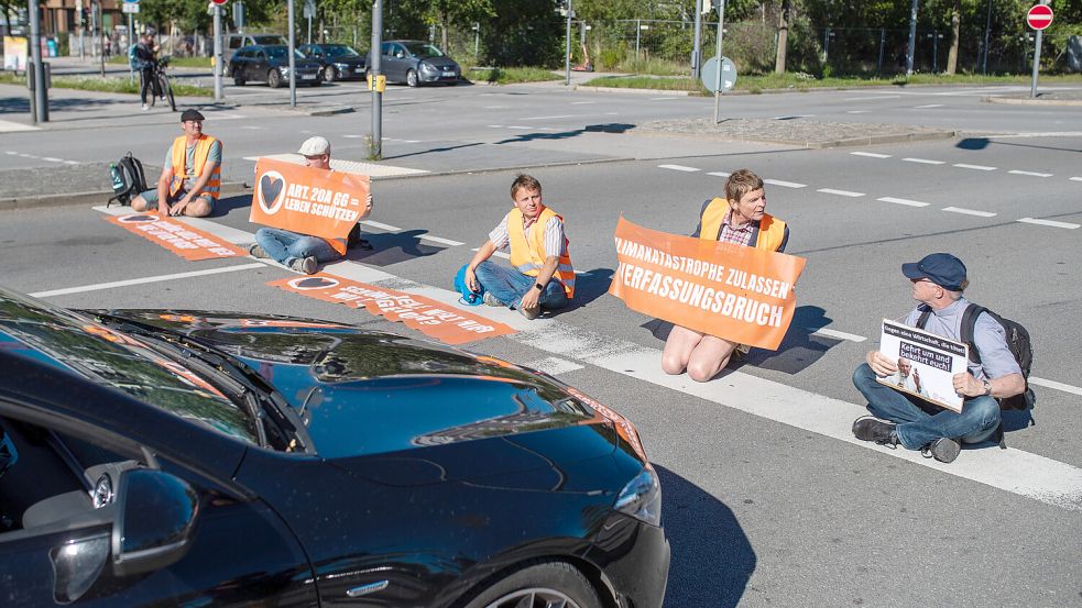 In Mannheim hat ein Mann auf Mitglieder der „Letzten Generation“ eingeprügelt. Foto: dpa/Christoph Schmidt
