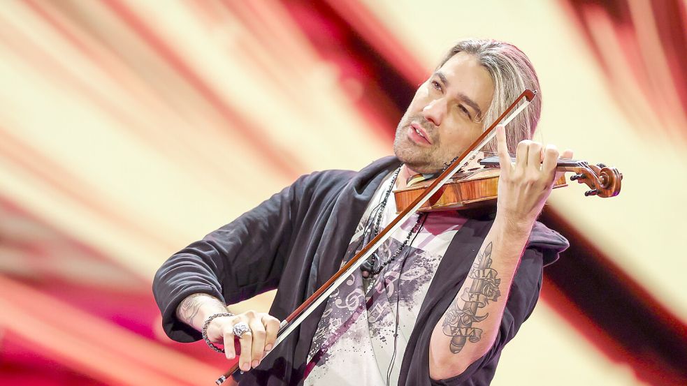 Kultiviert das Image des Teufelsgeigers: Der deutsche Geiger David Garrett spielt in der Roland-Kaiser-Show mit dem Titel „Liebe kann uns retten“. Foto: picture alliance/dpa/dpa-Zentralbild