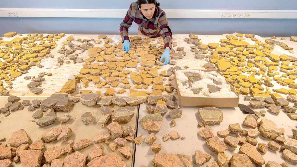 Mit akribischer Sorgfalt rekonstruierten Experten Wandmalereien aus einer antiken Luxusvilla in London. Foto: AFP/HANDOUT