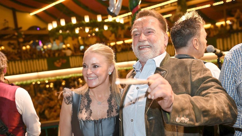 Begleitet wurde Schwarzenegger von seiner Lebensgefährtin Heather. Foto: Felix Hörhager