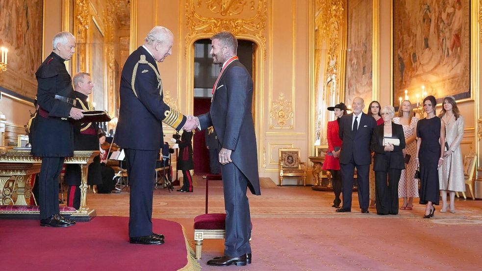 Beckham gilt als großer Verehrer des Königshauses. Foto: Jonathan Brady/PA via AP/dpa