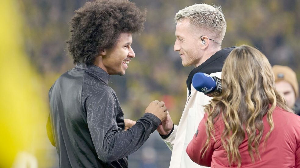 Begeistert gefeiert von Fans und ehemaligen Mitspielern: Marco Reus (r.) Foto: Bernd Thissen