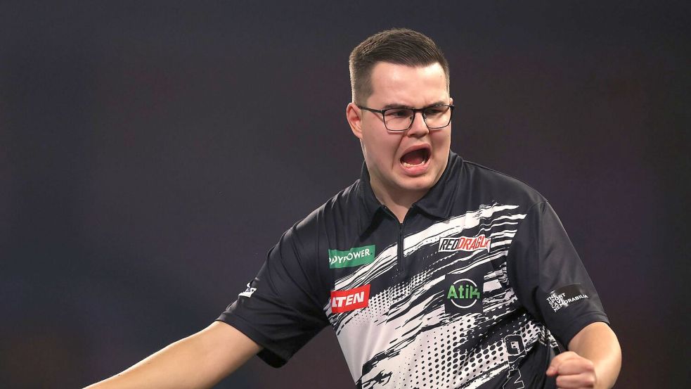 Van Veen jubelt im Duell mit Humphries. Foto: Steven Paston