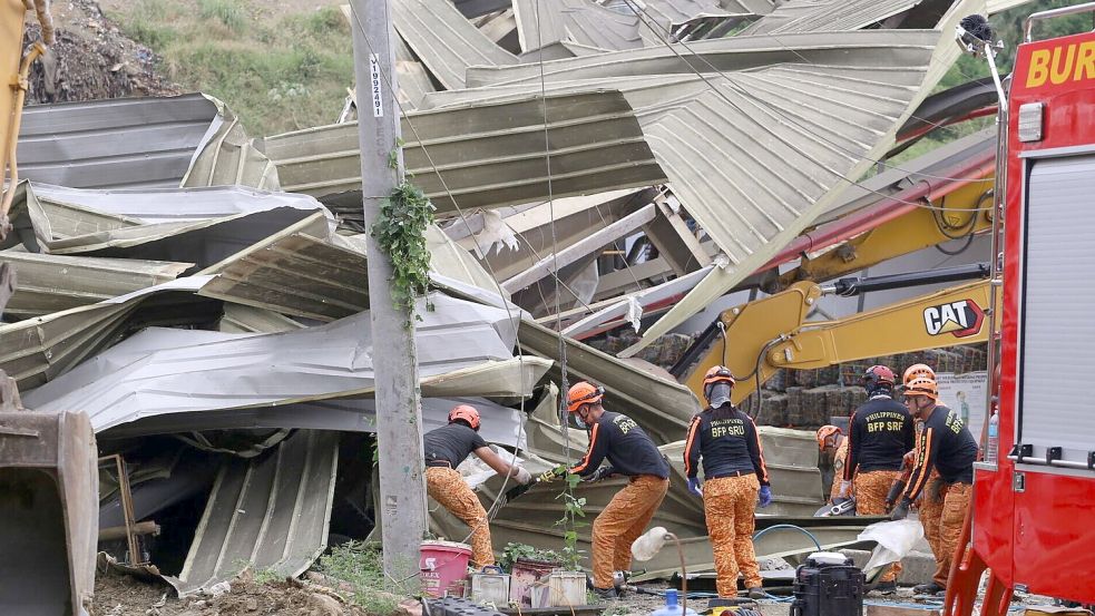 Anhaltende Regenfälle machten den Müllberg nach Angaben der Stadtverwaltung instabil. Foto: Jacqueline Hernandez/AP/dpa