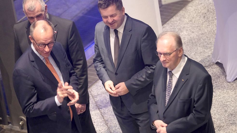 Merz sieht Grund für Zuversicht. Foto: Sebastian Willnow/dpa