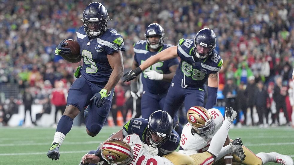 Drei Touchdowns für Kenneth Walker III (9). Foto: Lindsey Wasson/AP/dpa