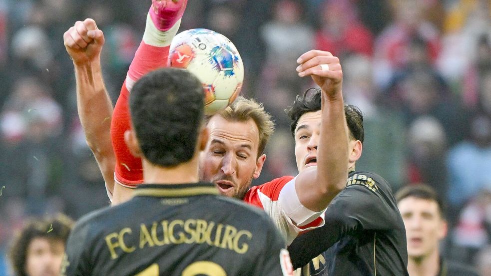 Als Kapitän ging Harry Kane (m) mit viel Einsatz voran. Foto: Peter Kneffel/dpa