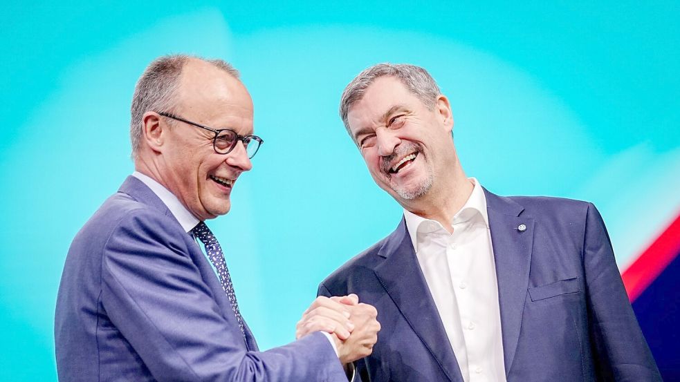 Zwischen diese beiden passt beim CDU-Parteitag kein Blatt. Foto: Kay Nietfeld/dpa