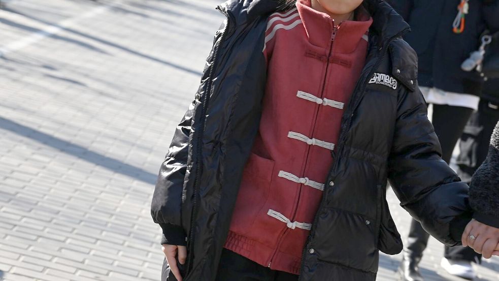 Eine Sportjacke im Tang-Dynastie-Look ist ein wichtiger Teil des Trends. Foto: Johannes Neudecker