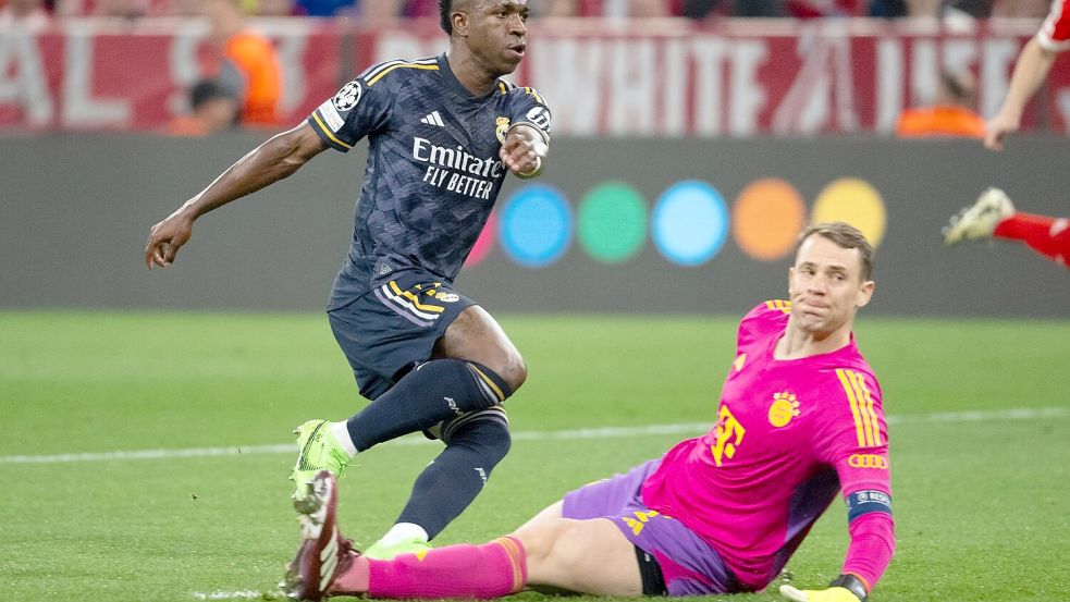 Brisantes Wiedersehen: Real-Star Vinícius Júnior und Bayern-Torwart Manuel Neuer. (Archivbild) Foto: Sven Hoppe