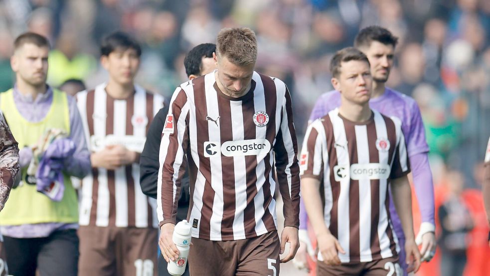 Hauke Wahl (M.) und Teamkollegen auf der Bundesliga-Abschiedsrunde. Foto: Philipp Szyza