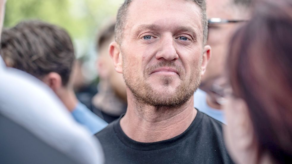 Tommy Robinson ist ein mehrfach verurteilter Straftäter. Trotzdem folgen ihm die Massen – warum? Foto: IMAGO/Lab Mo