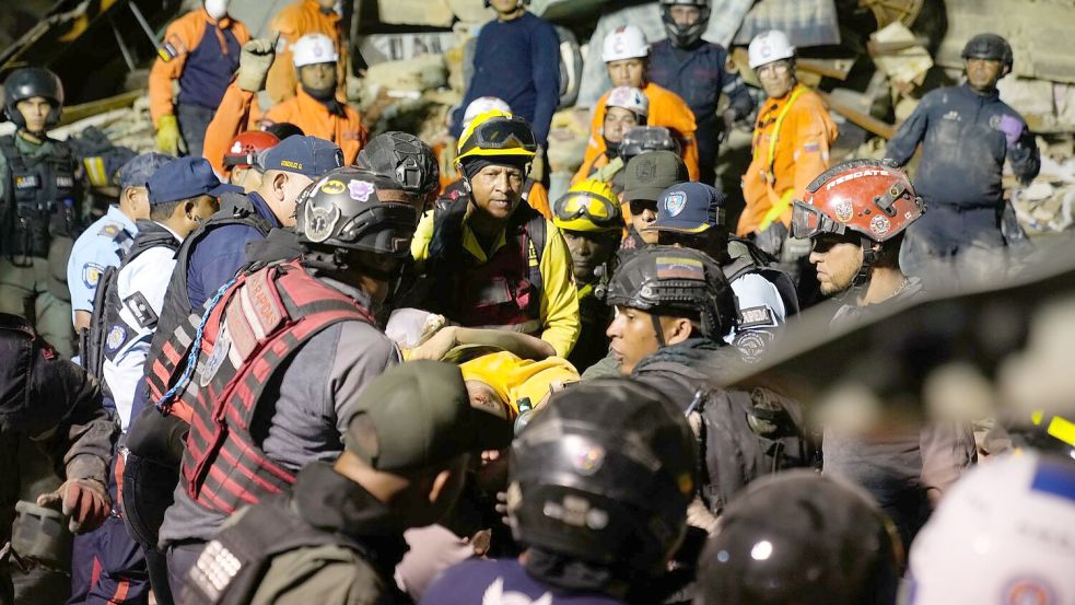 Die Rettungsteams geben die Hoffnung nicht auf. Foto: Ariana Cubillos