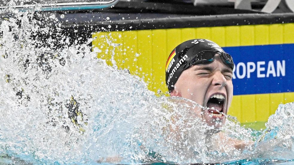 Johannes Liebmann schreit seine Freude heraus. Sonst ist er eher ruhig. Foto: Julien De Rosa/AFP/dpa