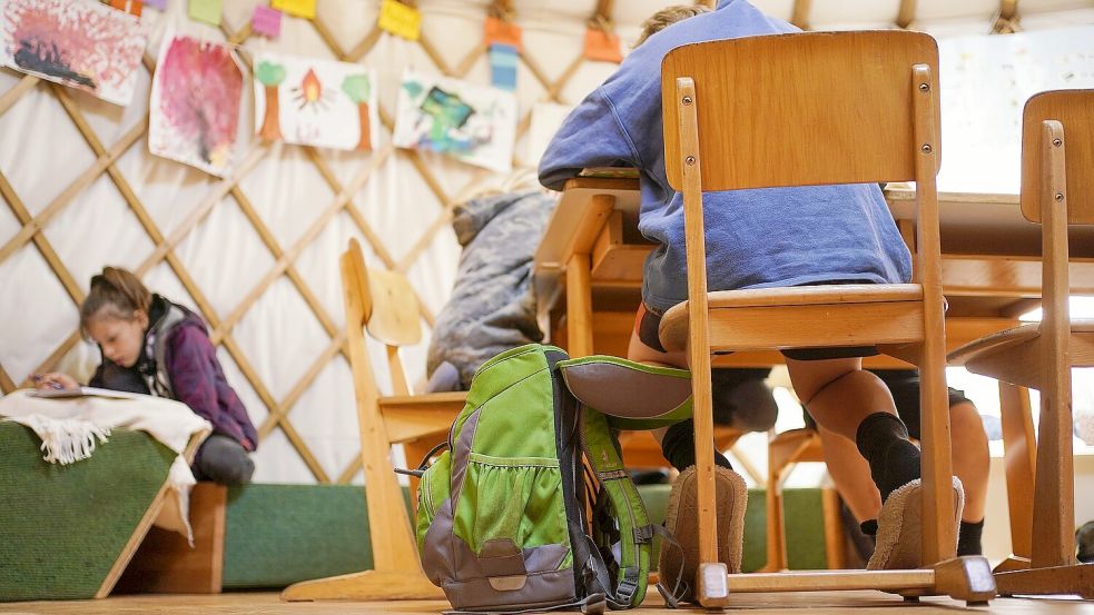 Teil der Ganztagsbetreuung ist in der Regel eine Phase, in der die Aufgaben bearbeitet werden. Foto: DPA