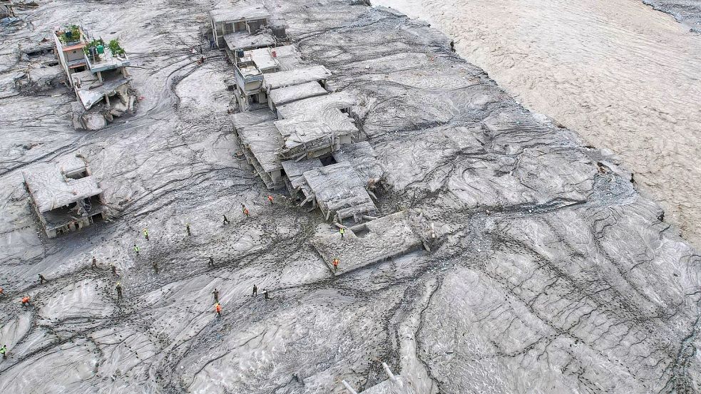 Die Sturzflut hatte ganze Landstriche im Schlamm versinken lassen. Foto: Rajesh Kumar Singh