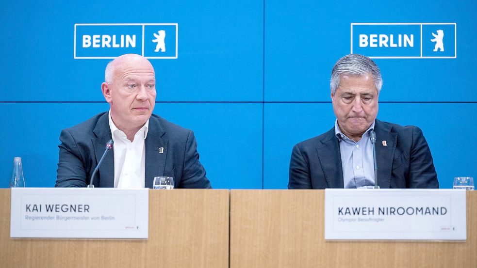 „Ein trauriger Tag für Berlin“: Wegner (l) und Niroomand verkünden das Ende der Bewerbung. Foto: Christophe Gateau/dpa