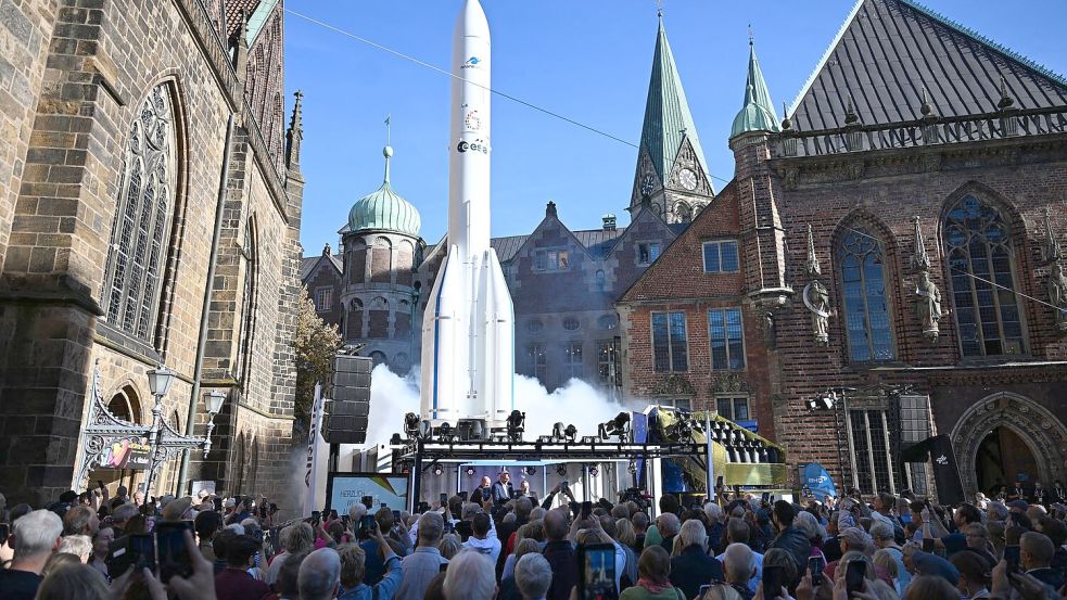 Das Bürgerfest begann mit einem symbolischen Raketenstart.  Foto: Sina Schuldt/dpa