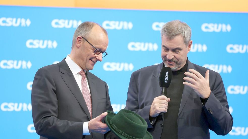 Beim letzten CSU-Parteitag bekam Merz einen Trachtenhut. Was bekommt er diesmal - außer Druck in der P-Frage? Foto: Karl-Josef Hildenbrand/dpa